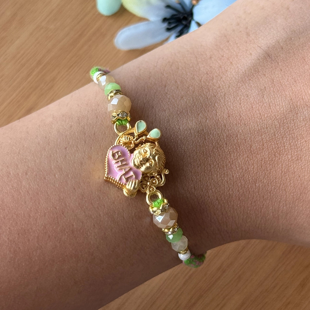 Handmade Beaded Bhai Rakhi With Roli Chawal 3 - Close-up on Wrist