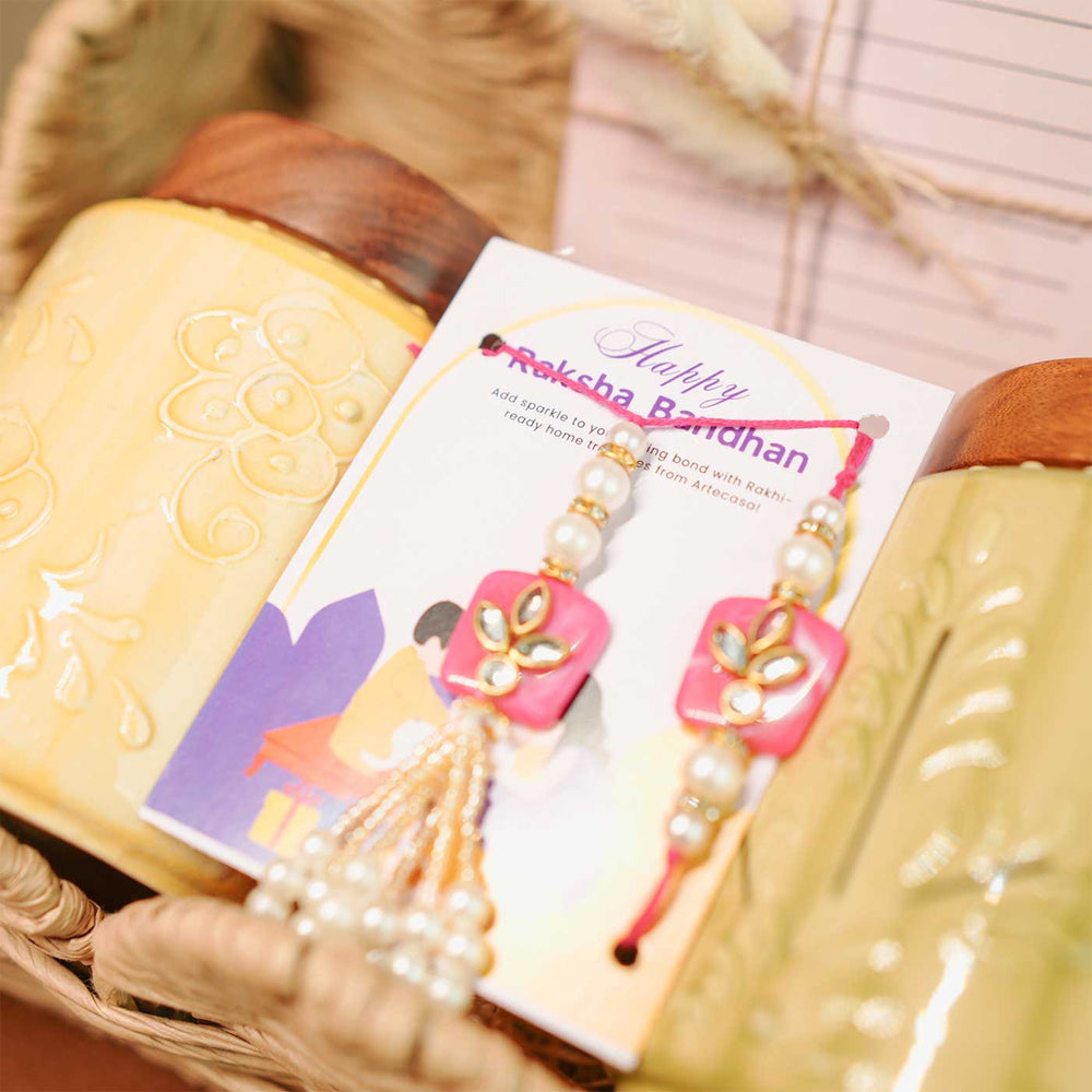 Personalized Handmade Rakhi Hamper Includes 1 Basket 2 Jars 2 Rakhis 1 Roli Chawal And 1 Message Card - Close-up on Rakhi and Card
