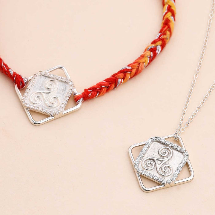 Handmade Three Swirl Design Silver Rakhi For Brother - Close-up of bracelet and necklace