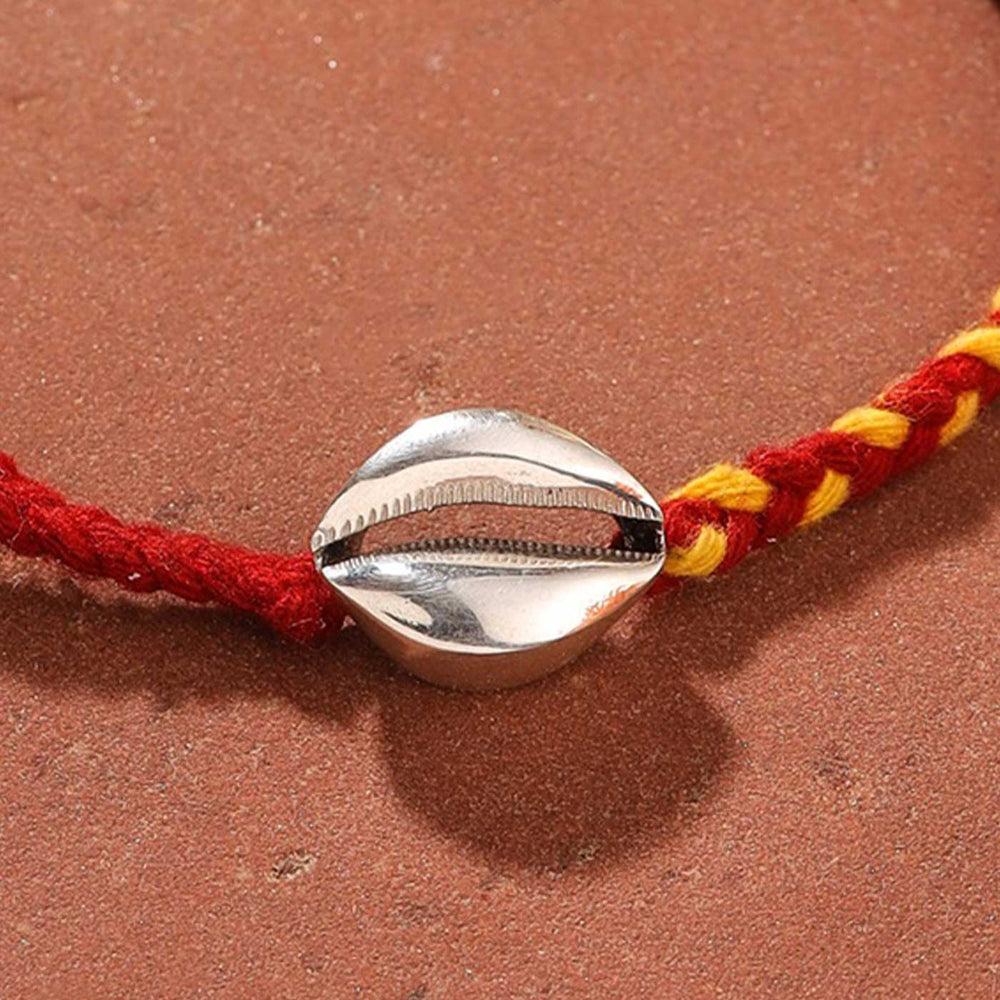 Handmade Shell Design Silver Rakhi For Brother - Close-up of Shell Charm Detail