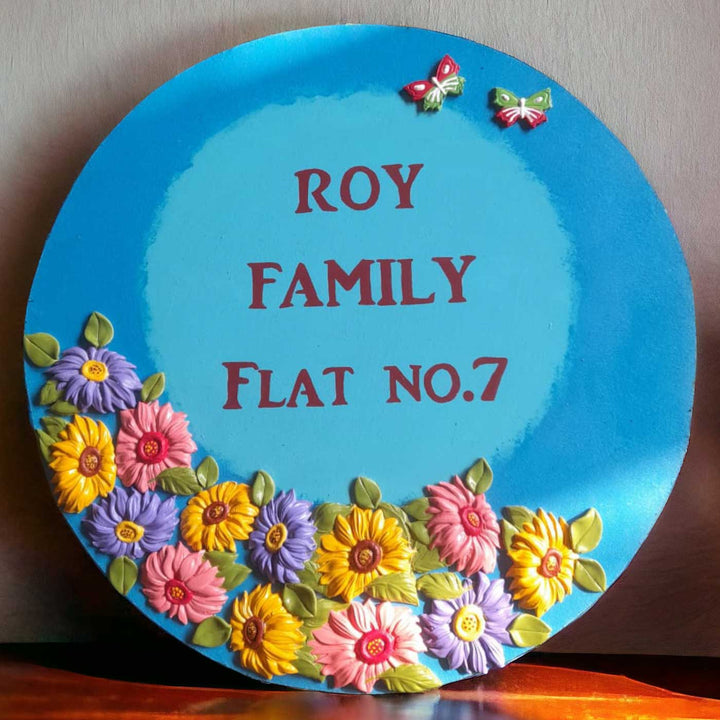 Personalized Handmade Floral Round Mdf Wood Name Plate - Front View with Floral Decoration and Text