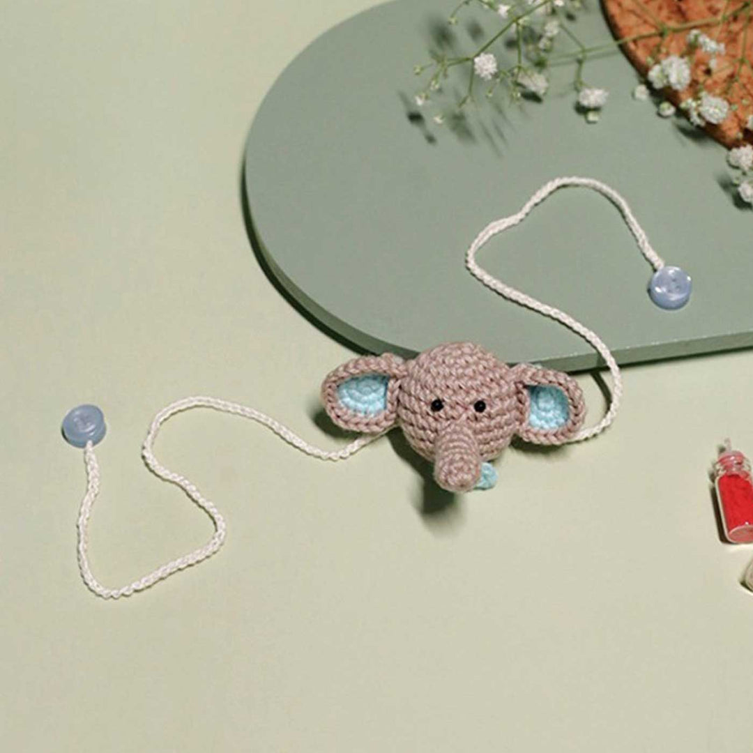 Handmade Crochet Dumbo Kids Rakhi With Roli Chawal - Close-up of Single Elephant Toy