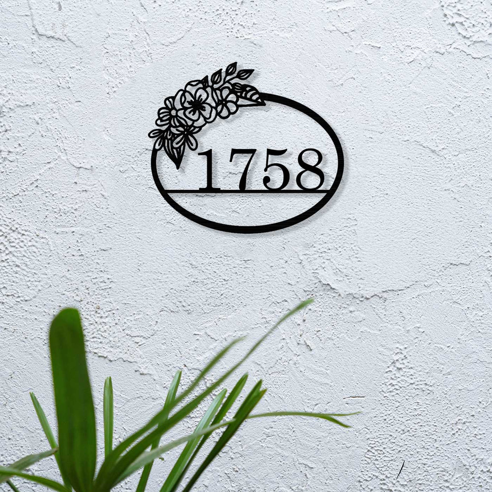 Personalized Laser Cut Floral Design Steel Name Plate - Mounted on Textured Wall Front View