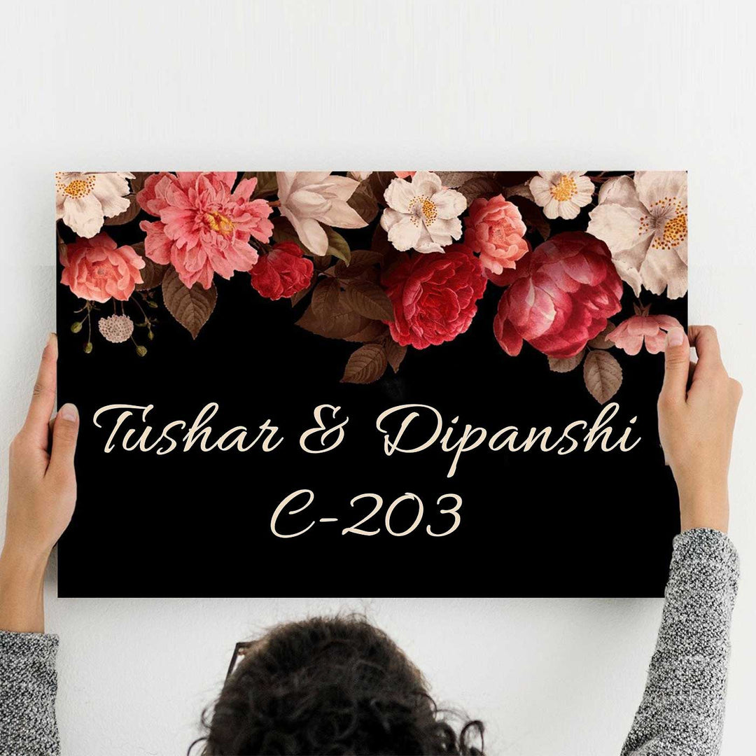 Printed Black Floral Wooden Rectangle Nameplate - Name Personalization ExampleHeld Front View