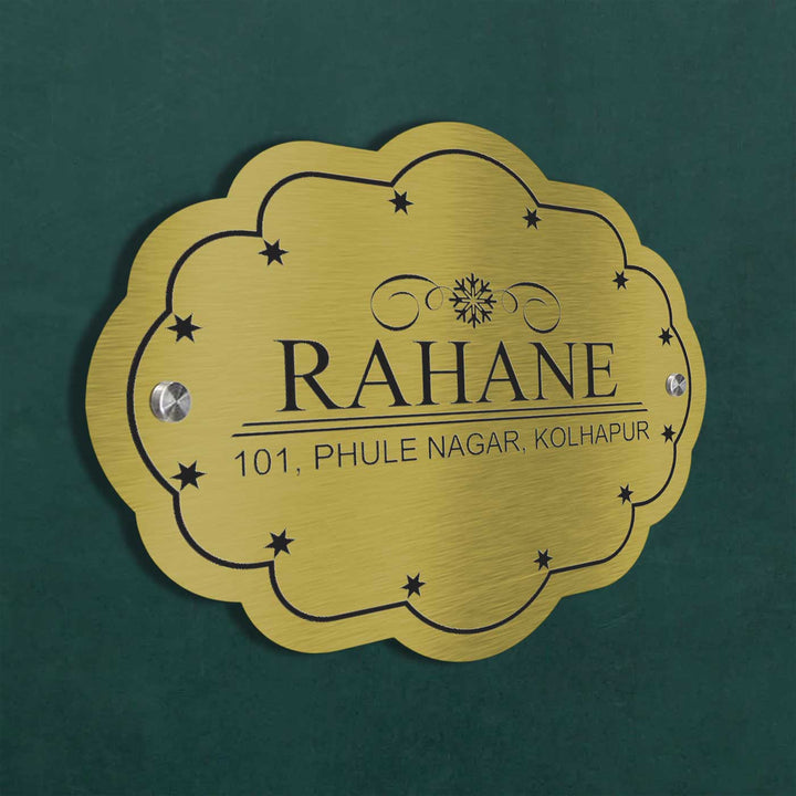 Personalized Weatherproof Cloud Shaped Engraved Gold Stainless Steel Name Plate - Mounted on Wall Close-up Angle