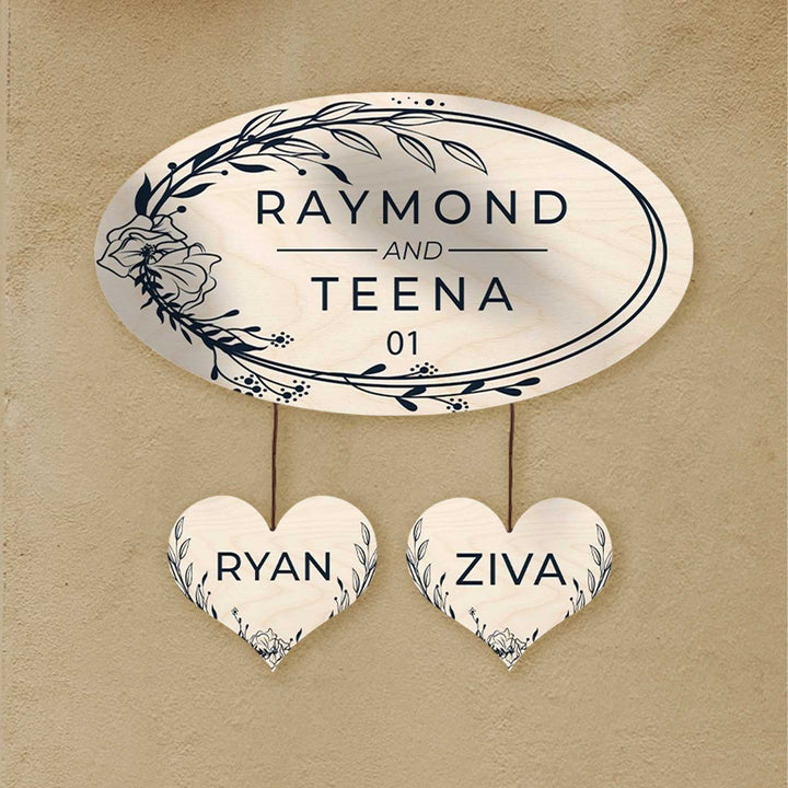 Printed Floral Wooden Oval Nameplate For Couples - Mounted on Wall with Hanging Hearts