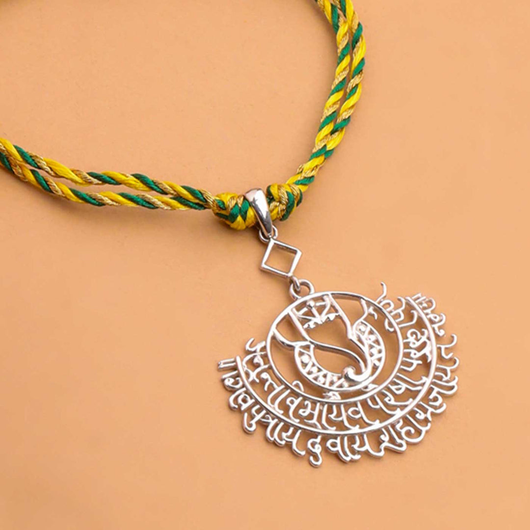 Handmade Ganesha Theme Religious Silver Lumba Rakhi For Bhabhi - Pendant Close-up on Rakhi