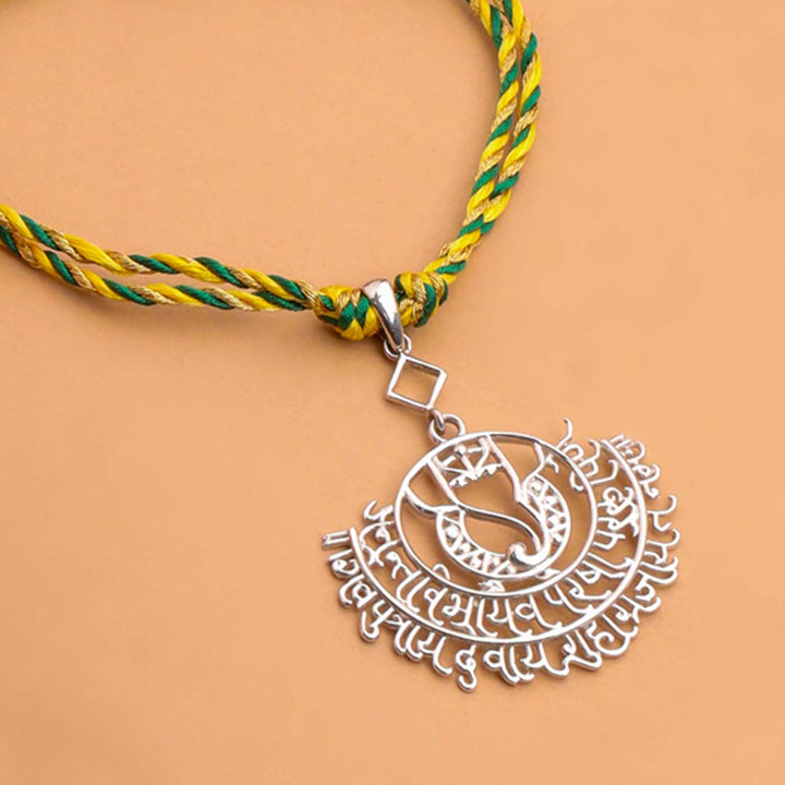 Handmade Ganesha Theme Religious Silver Lumba Rakhi For Bhabhi - Pendant Close-up on Rakhi
