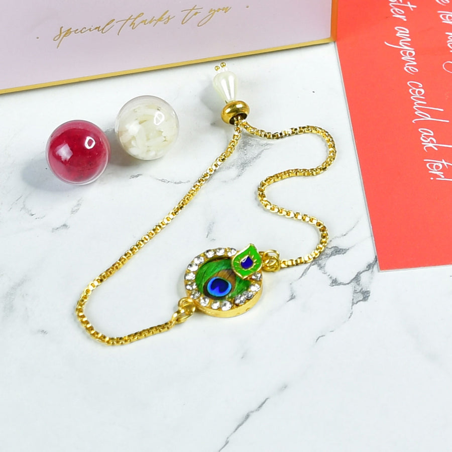 Beaded Peacock Pearl And Stone Bracelet Rakhi Hamper With Chocolates And Roli Chawal For Brother Customizable Options Includes Up To 7 Goodies - Close-up of Rakhi bracelet