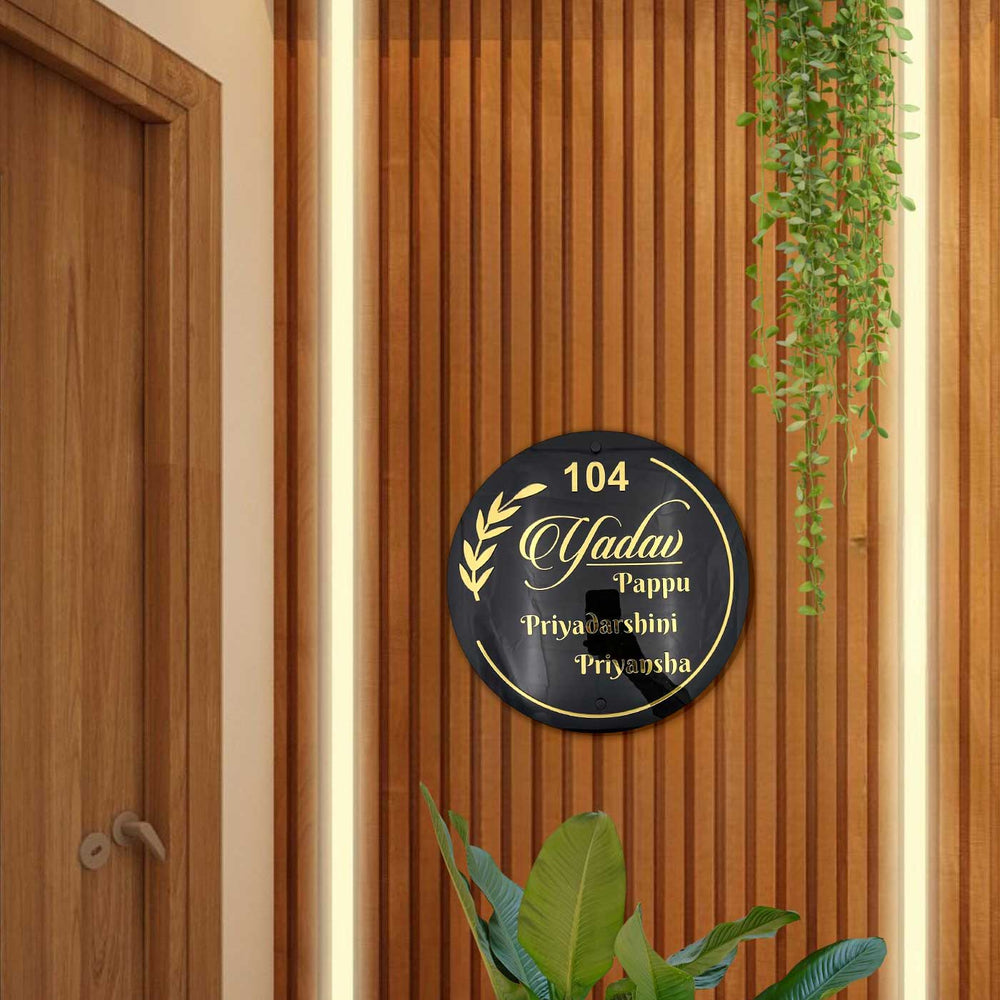 Personalized Gold And Black Acrylic Name Plate - Mounted on Entryway Wall