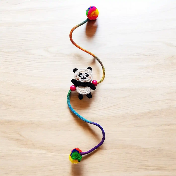 Handmade Dori Work Cute Panda Kids Rakhi With Roli Chawal - Full Length View on Surface