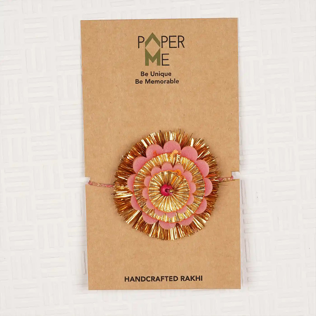 Handmade Layered Pink And Golden Foam Rakhi With Roli Chawal - On Branded Packaging Card