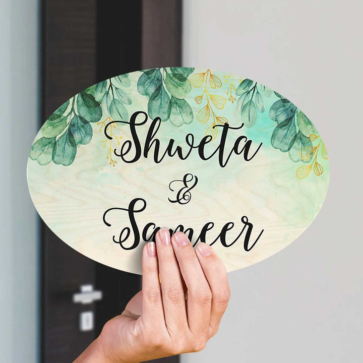 Printed Green Spring Floral Wooden Oval Nameplate - Name Personalization Example Held in Hand