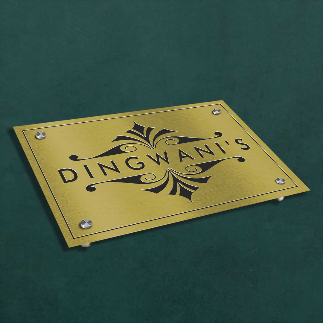 Personalized Engraved Minimalist Gold Stainless Steel Name Plate - Angled Top View on Surface