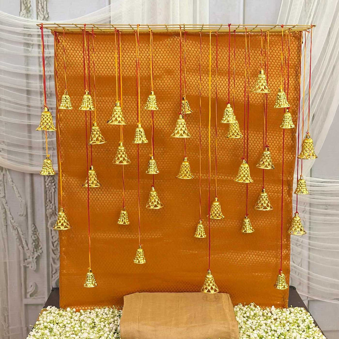 Orange Brocade Pooja Backdrop Decor Kit With Jaali Stand, Hanging Bells & Nada Chadi