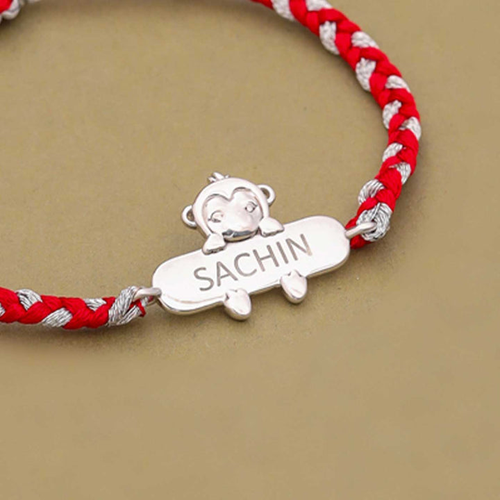 Personalized Handmade Monkey Design Silver Kids Rakhi - Name Engraving Close-up