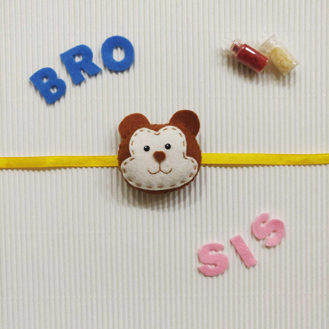Handmade Monkey Theme Felt Kids Rakhi With Roli Chawal - Front View with Text Decorations