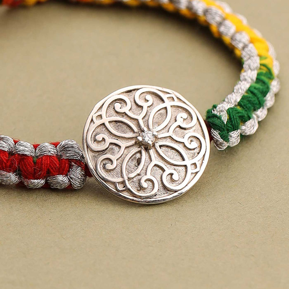 Handmade Swirl Design Silver Rakhi For Brother - Close-up of Embellishment