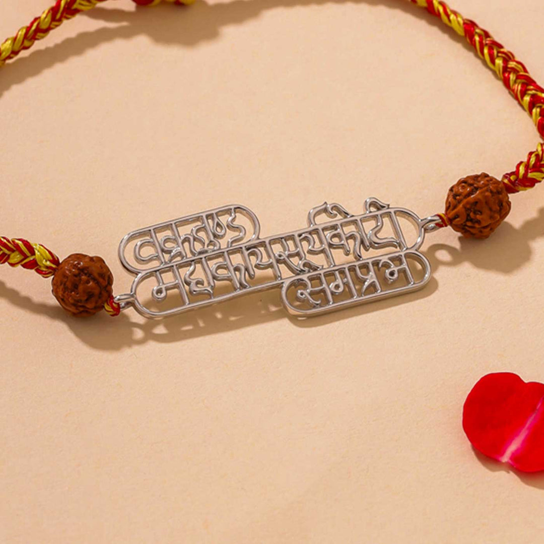 Handmade Ganesha Vandana Religious Silver Rakhi For Brother - Close-up of Pendant Detail