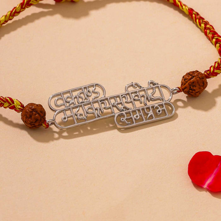 Handmade Ganesha Vandana Religious Silver Rakhi For Brother - Close-up of Pendant Detail