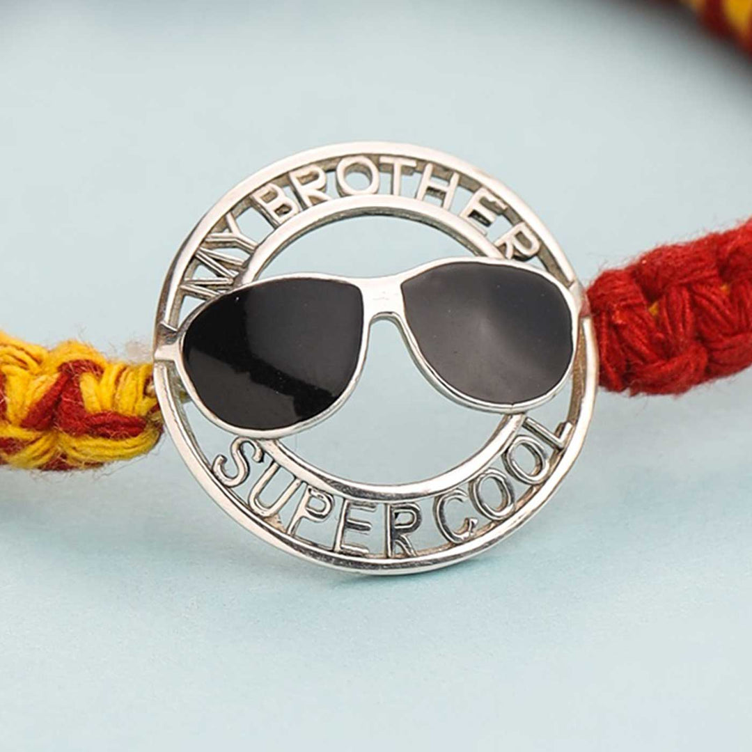Handmade Super Cool Design Silver Rakhi For Brother - Close-up of Metal Charm