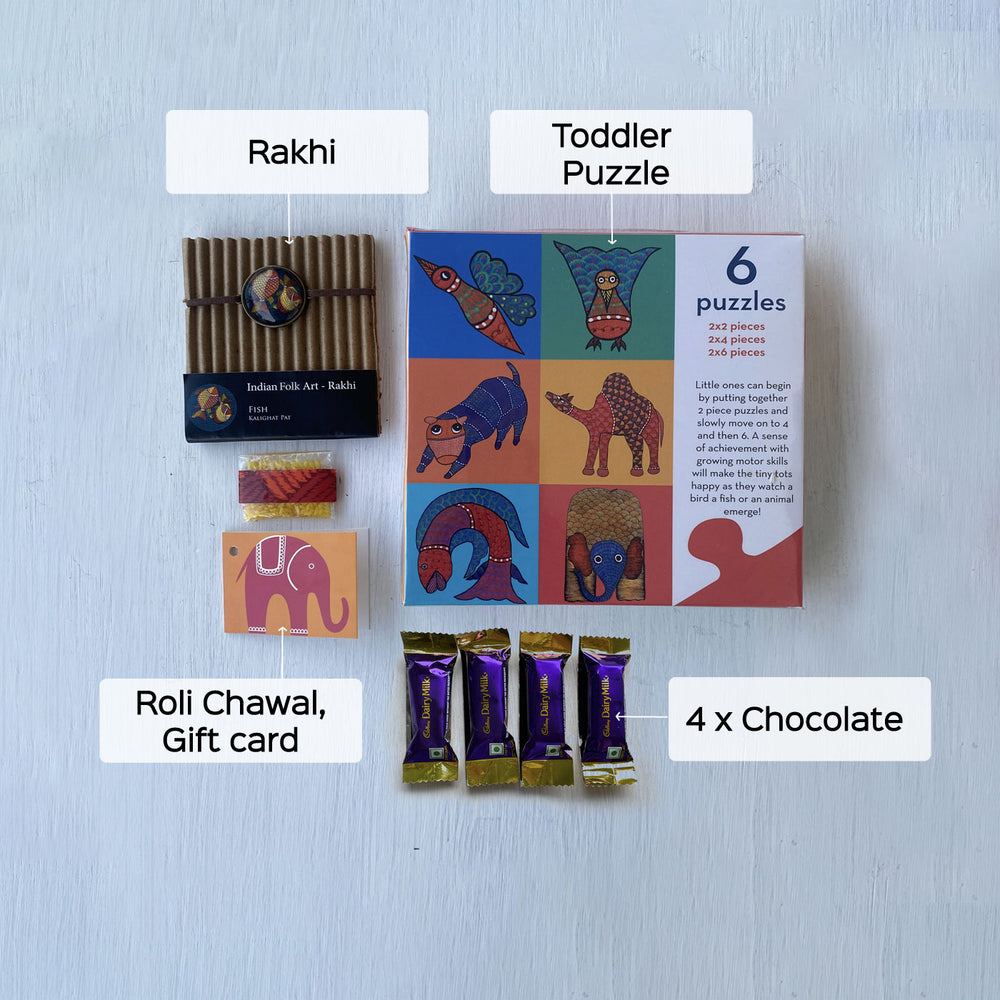 Handcrafted Folk Art Rakhi Hamper For Toddlers With Rice Roli Haldi 1 - Flat Lay with Labeled Items