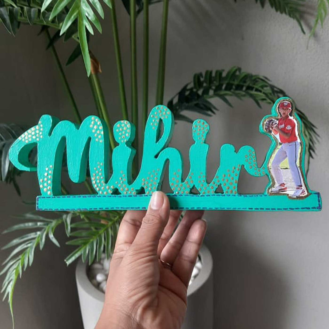 Personalized Handmade Kalakaar Wooden Cutout Name Plate For Boys - Handheld Front View with Background