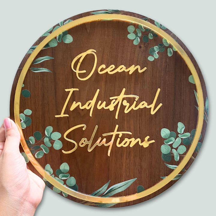 Personalised Wooden Floral Round Nameplate 2 - Handheld Front View Showing Personalization