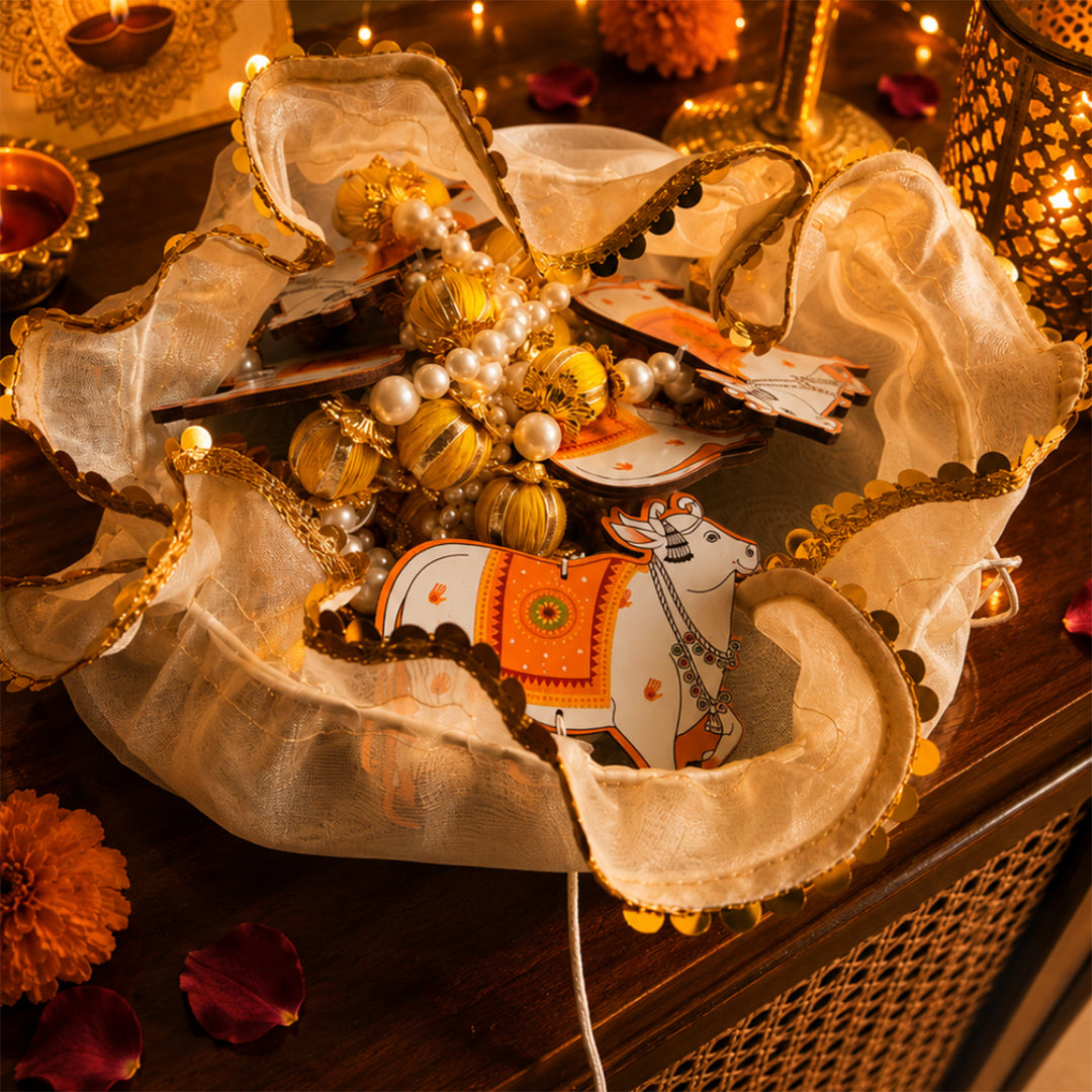 Emerald Festive Harvest Green Diwali Gift Hamper With Toran Potli, Urli Candle And Almonds For Festive Gifting