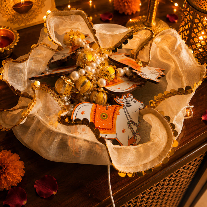 Emerald Festive Harvest Green Diwali Gift Hamper With Toran Potli, Urli Candle And Almonds For Festive Gifting