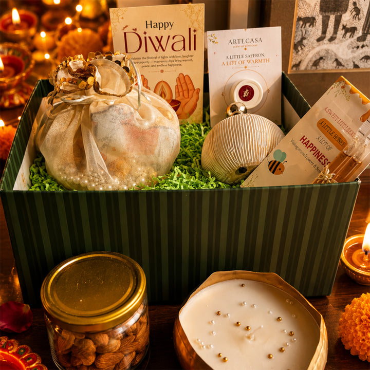 Emerald Festive Harvest Green Diwali Gift Hamper With Toran Potli, Urli Candle And Almonds For Festive Gifting