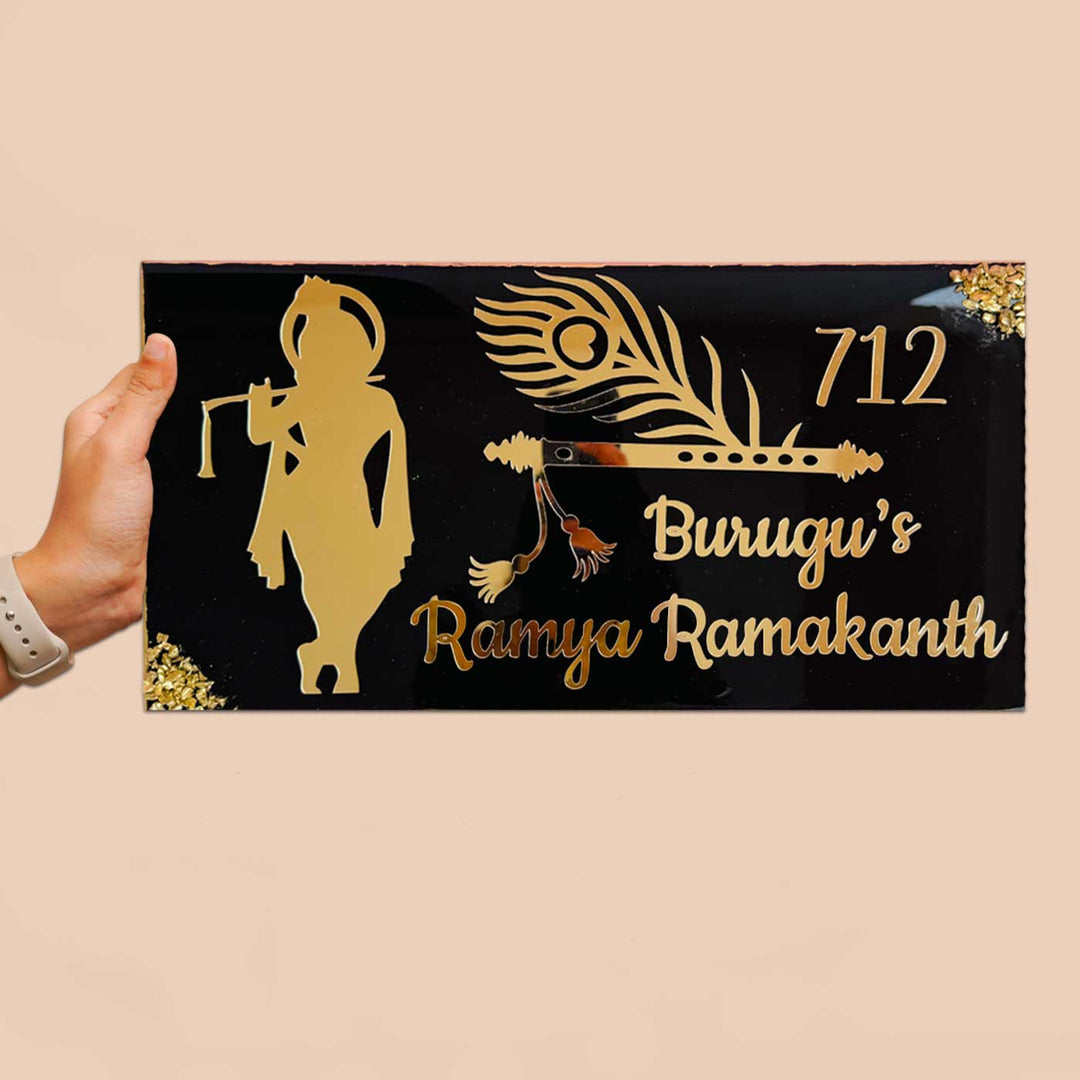 Personalized Black And Gold Krishna Theme Resin Name Plate For Family - Handheld Front View with Personalization