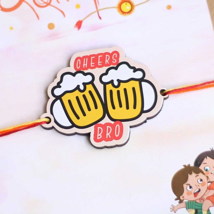 Handmade Cheers Bro Magnet Wooden Rakhi With Roli Chawal For Brother - Front Close-up