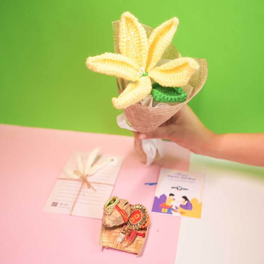 Personalized Handmade Crochet Yellow Lily Rakhi Hamper Includes 1 Crochet Flower 1 Message Card And 1 Rakhi And Roli Chawal - Hand Holding Crochet Flower Arrangement