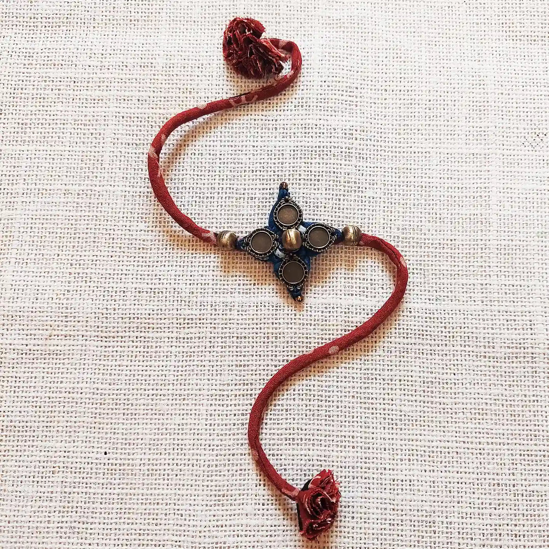 Handmade Dori Work And Ghungroo Bhaiya Bhabhi Rakhi With Roli Chawal Set Of 2 - Front View of Single Piece