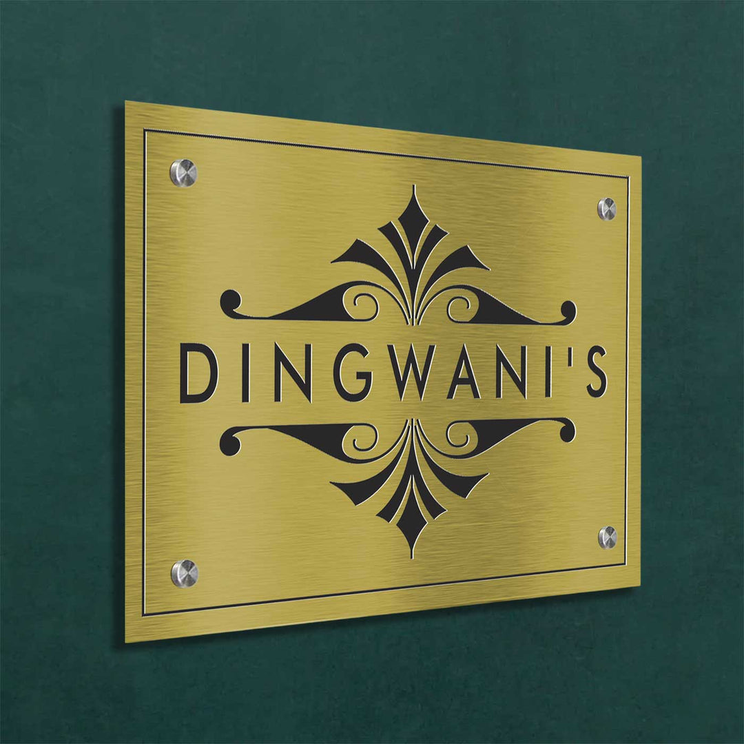 Personalized Engraved Minimalist Gold Stainless Steel Name Plate - Mounted on Dark Wall Side Angle
