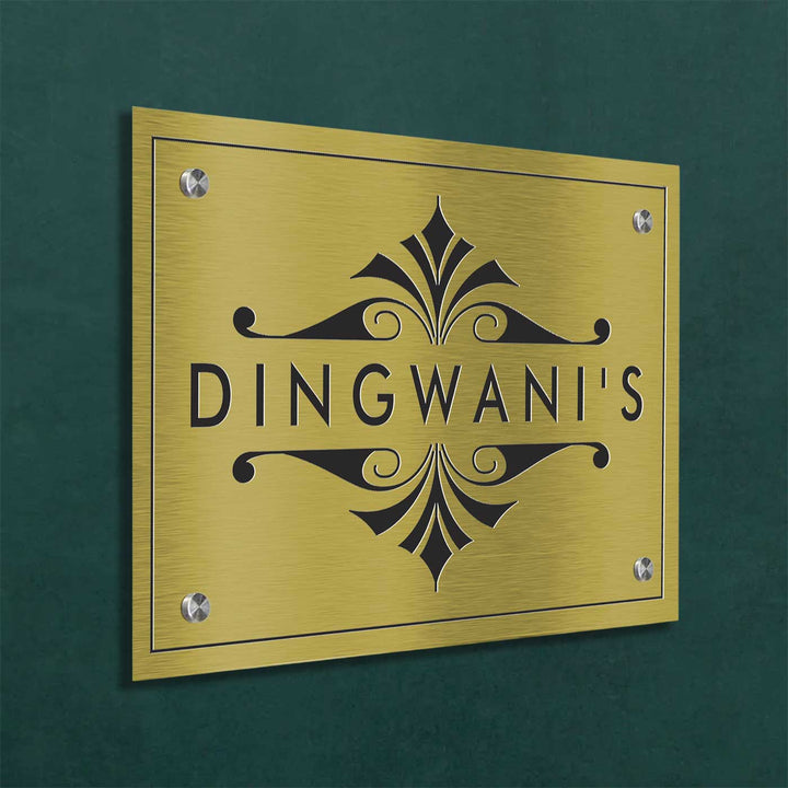Personalized Engraved Minimalist Gold Stainless Steel Name Plate - Mounted on Dark Wall Side Angle