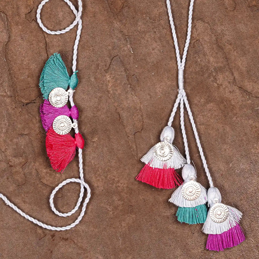 Handmade Tassel And Sikka Bhaiya Bhabhi Rakhi With Roli Chawal Set Of 2 - Close-up of tassel details