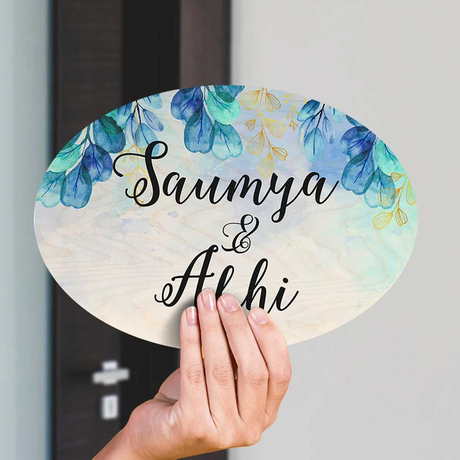 Printed Blue Spring Floral Wooden Oval Nameplate - Name Personalization Example Held in Hand
