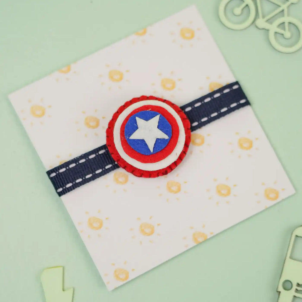 Handmade Superhero Theme Felt Kids Rakhi With Roli Chawal - Front View on Card