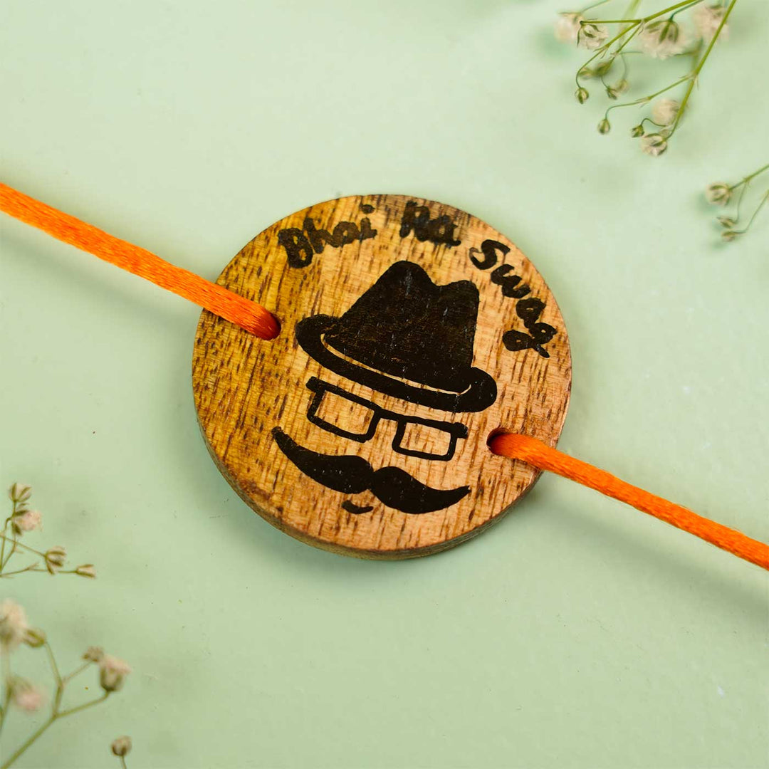 Personalized Hand Painted Bhai Swag Wooden Rakhi With Roli Chawal - Close-up of Wooden Pendant