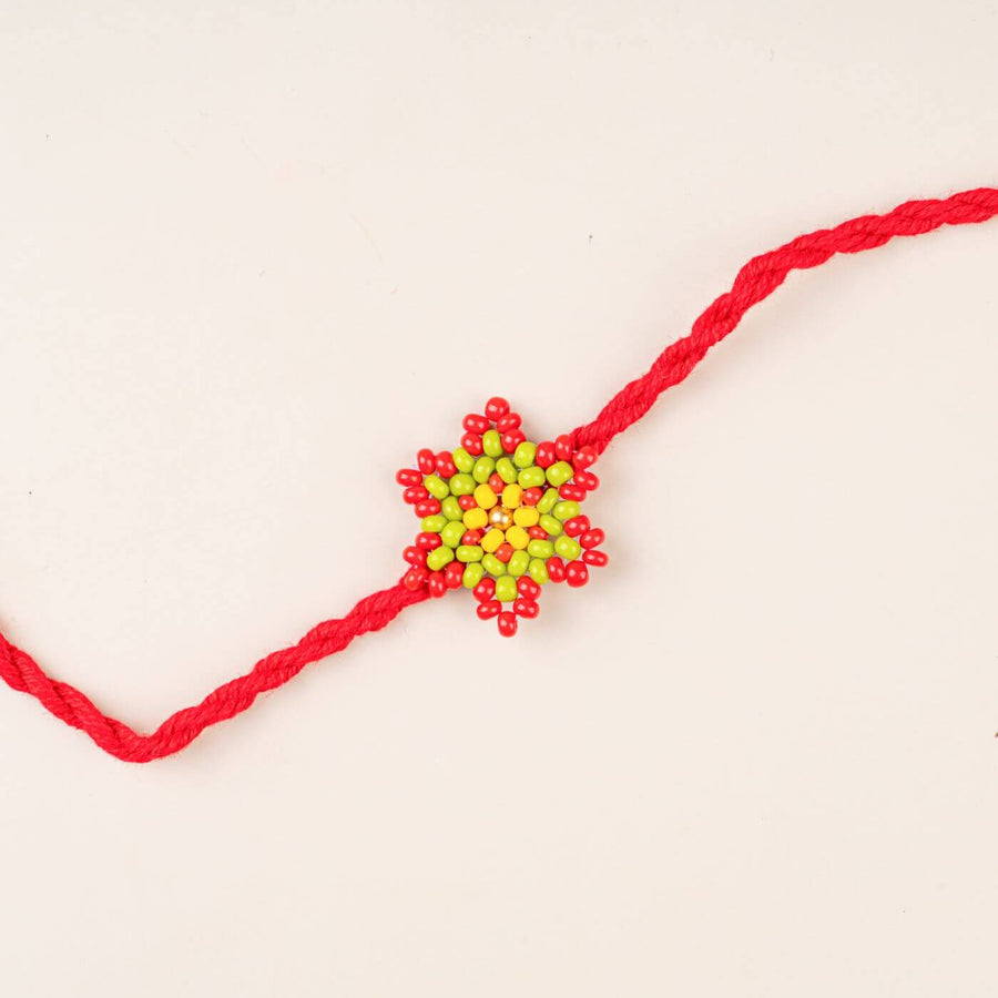 Handcrafted Glass Beads Phool Rakhi 3 - Close-up of Rakhi design