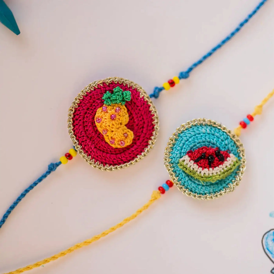 Handmade Crochet Fruits Theme Kids Rakhi With Roli Chawal Set Of 2 - Close-up Front View