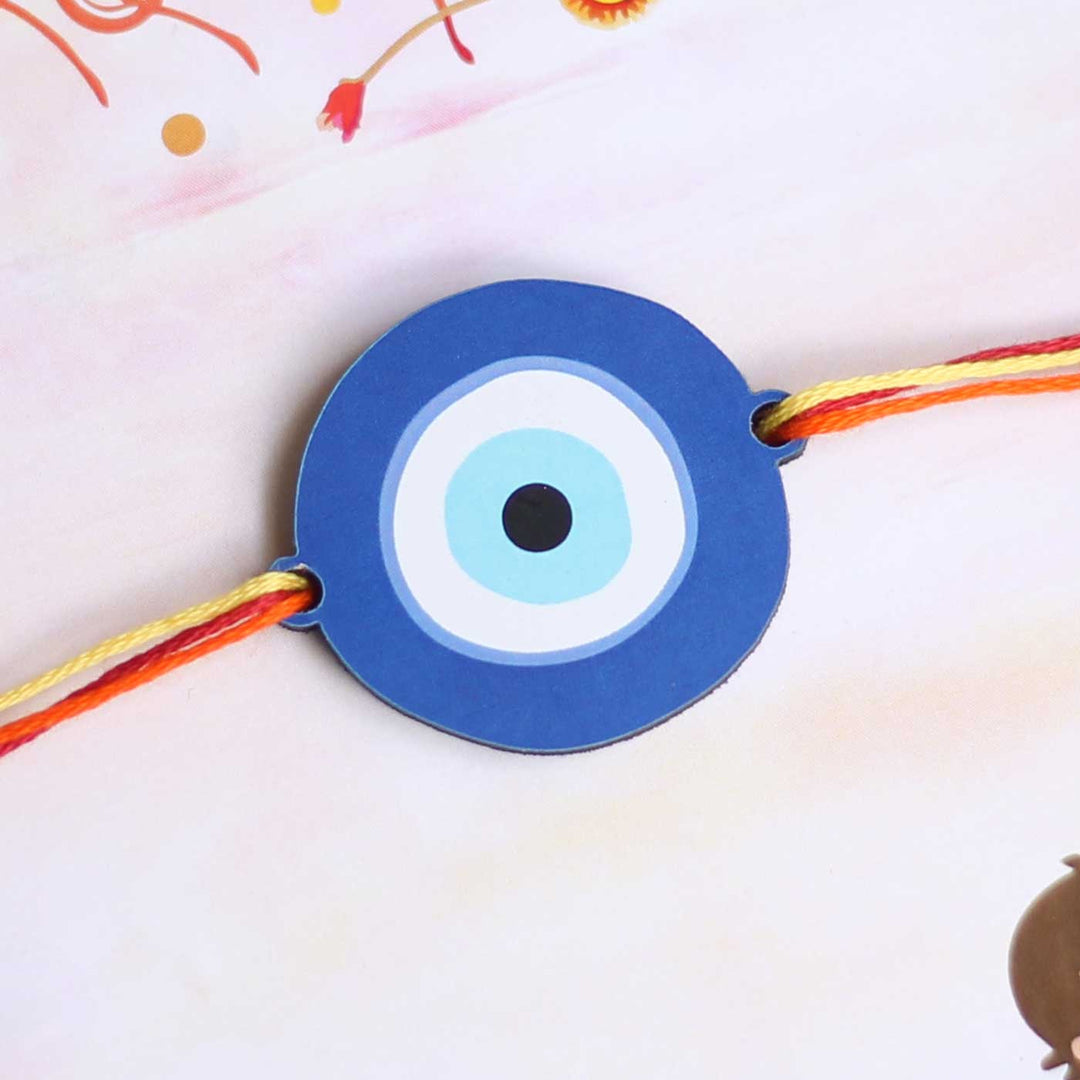 Handmade Evil Eye Design Magnet Wooden Rakhi With Roli Chawal - Close-up View of Evil Eye Charm