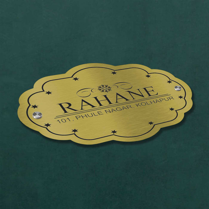 Personalized Weatherproof Cloud Shaped Engraved Gold Stainless Steel Name Plate - Top view on flat surface