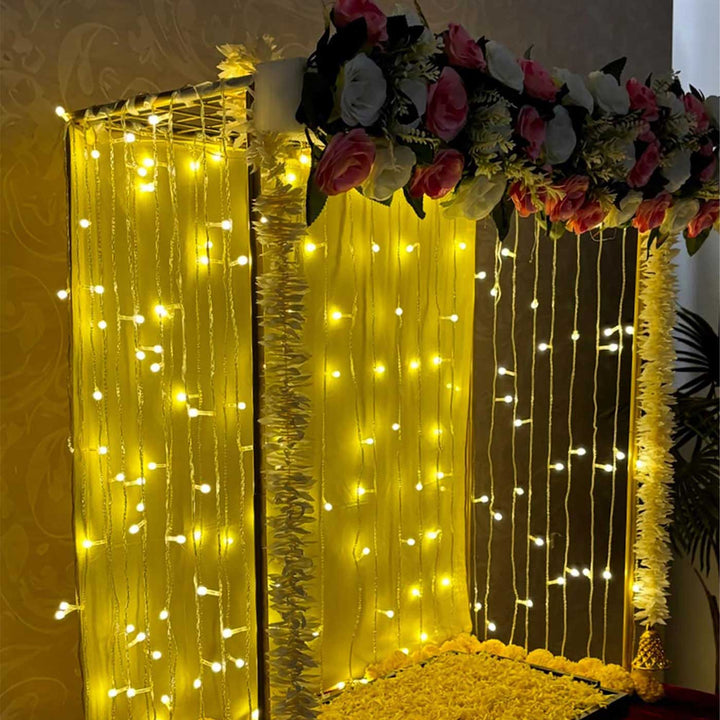 Royal Mandap Backdrop Decor Kit With Artificial Floral Panel, Bell Garlands & Fairy Lights