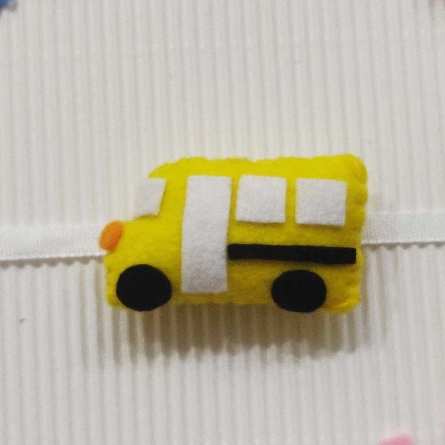 Handmade Bus Theme Felt Kids Rakhi With Roli Chawal - Close-up of single item