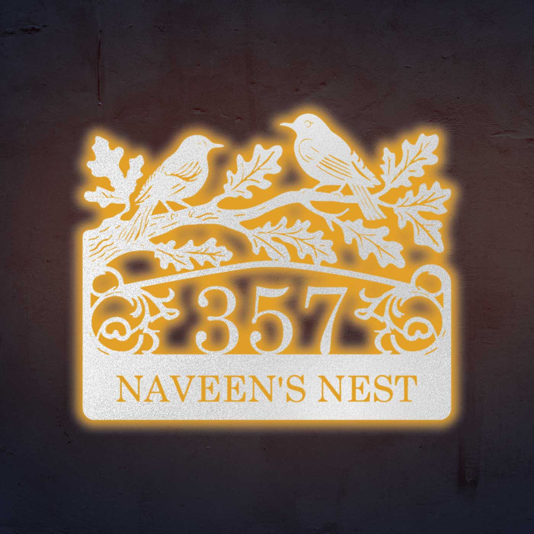 Personalized Laser Cut Birds Theme Steel Name Plate - Illuminated Front View on Wall