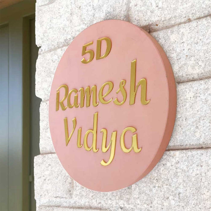 Personalized Minimal Peach Mdf Wood Name Plate - Mounted on Stone Wall Side Angle