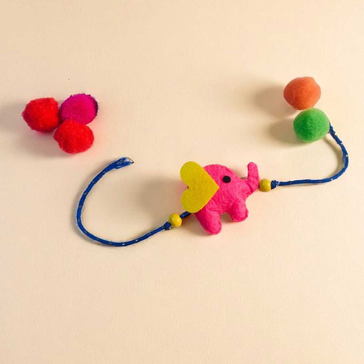 Customized Handmade Beaded Elephant Theme Pom Pom Felt Rakhi With Roli Chawal For Kids - Full Bracelet View